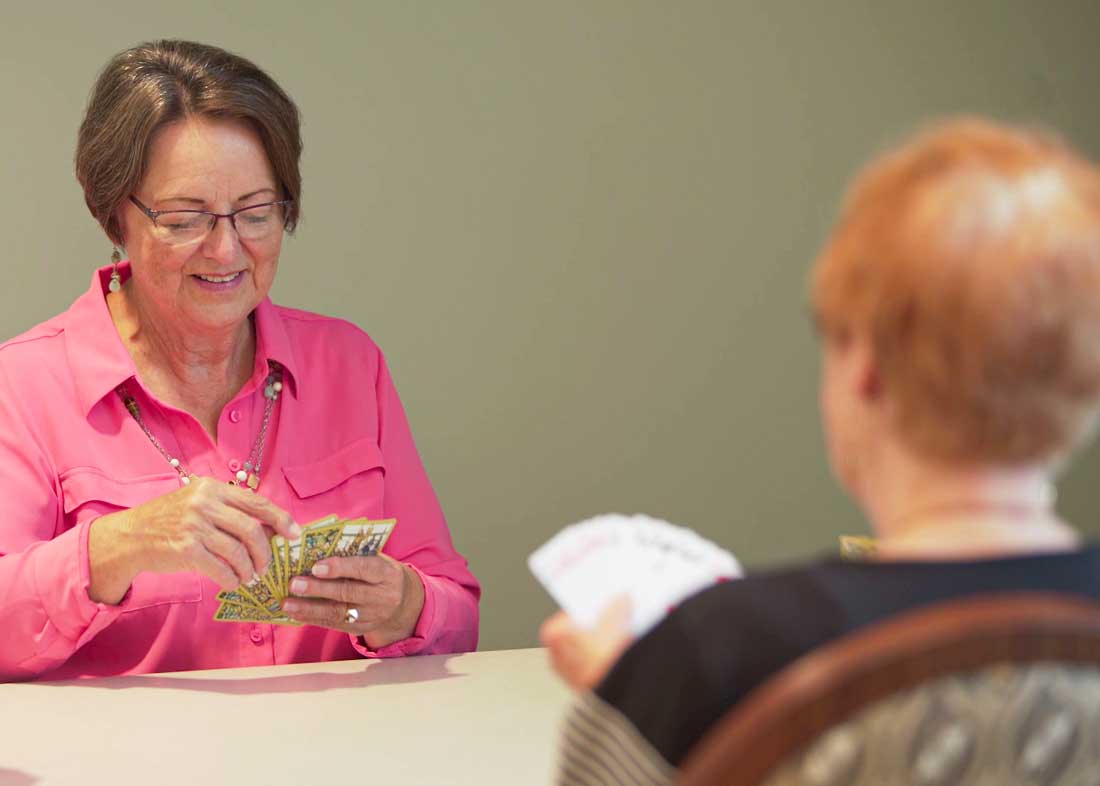 Sunset_women-playing-cards