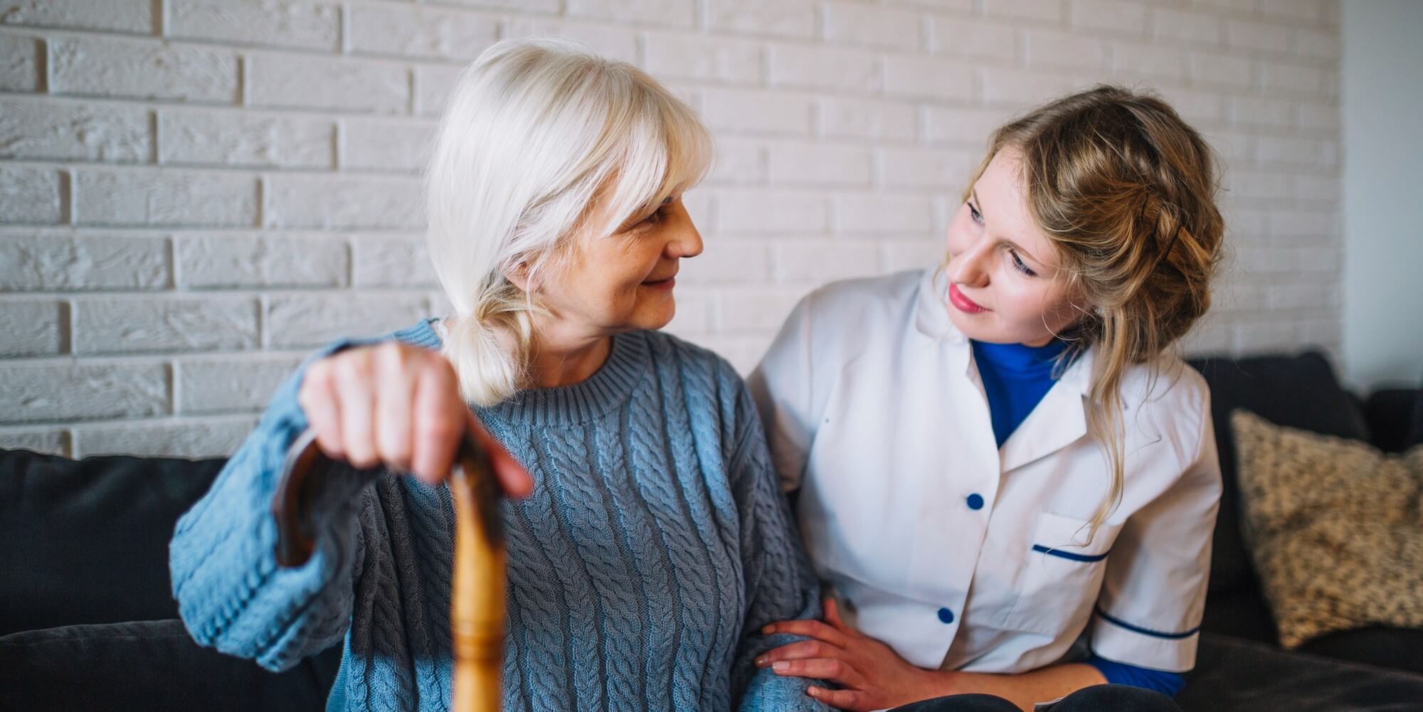 caregiver checking on a senior