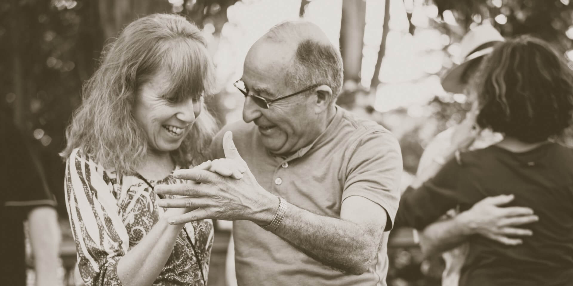 senior couple dancing together