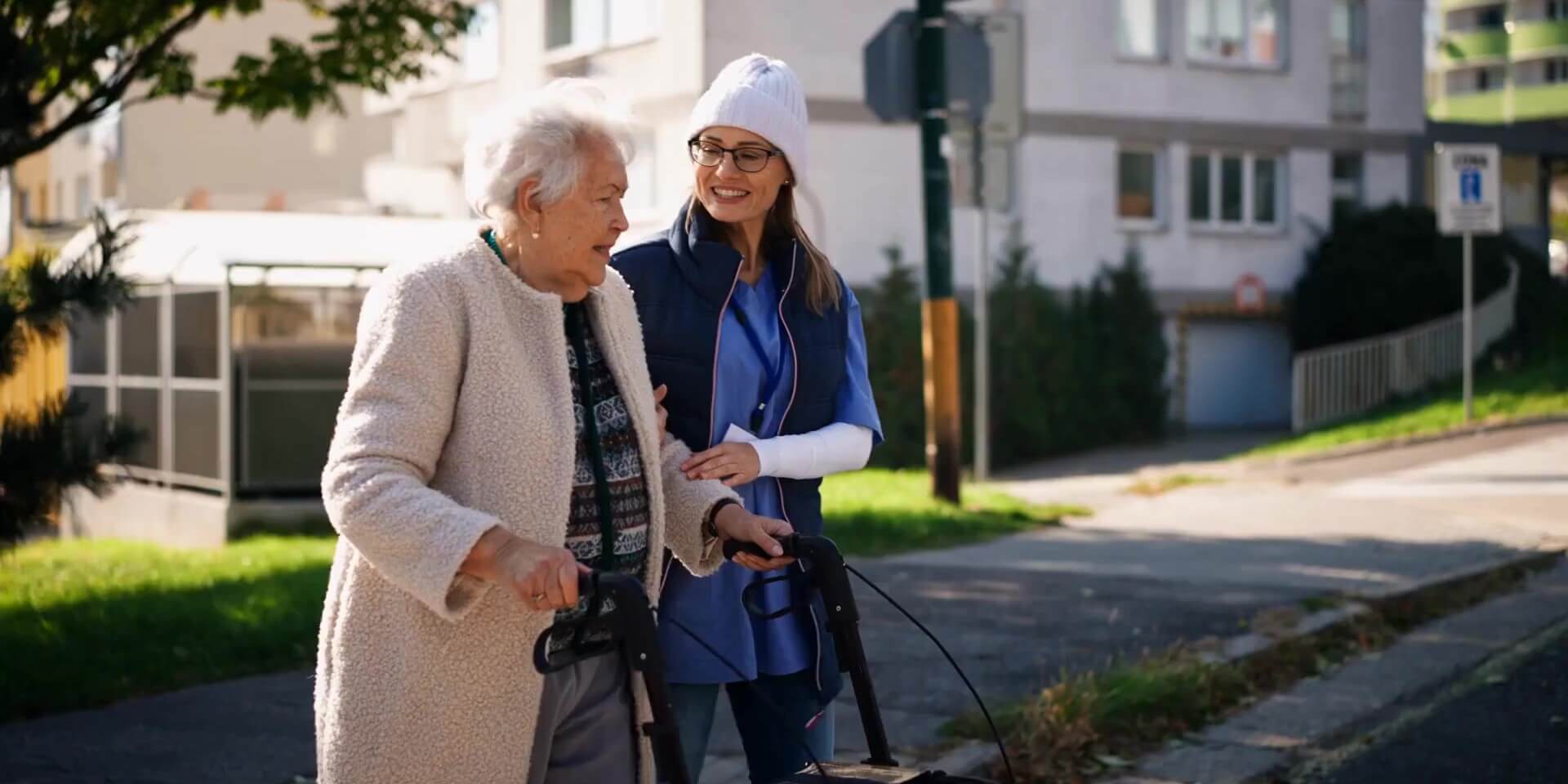 someone explaining senior living terms to an older adult