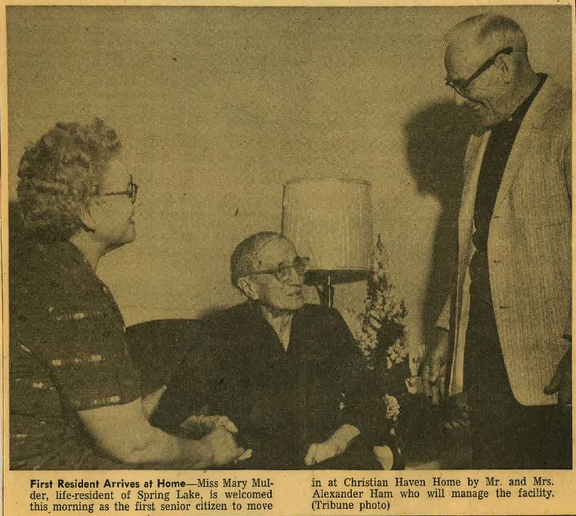 Newspaper clipping of Christian Haven Home managers welcoming first resident, Mary Mulder